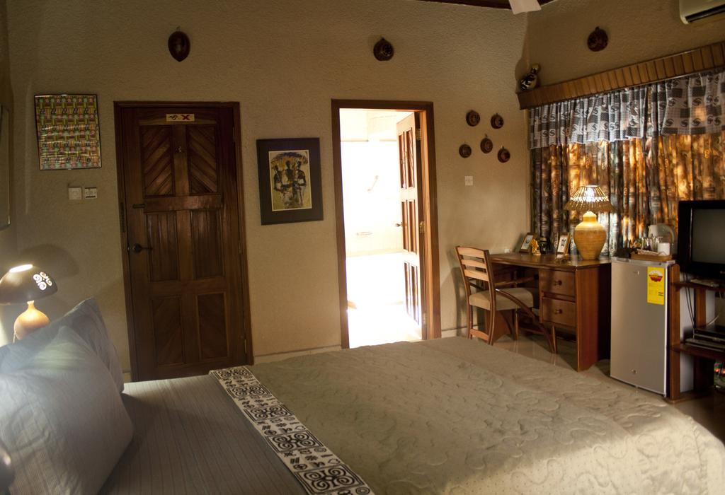 Four Villages Inn Kumasi Habitación foto