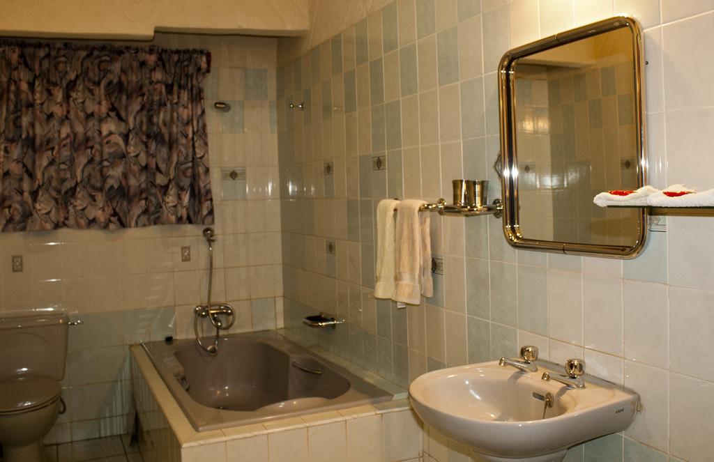 Four Villages Inn Kumasi Habitación foto